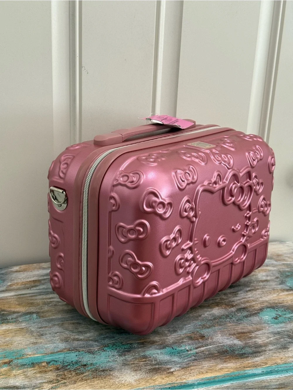 NWT FŪL Hello Kitty 13” Metallic Pink Hardshell Suitcase w/Logo Design